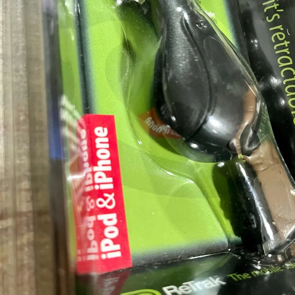 NIB ReTrak retractable iPod and iPhone car charger